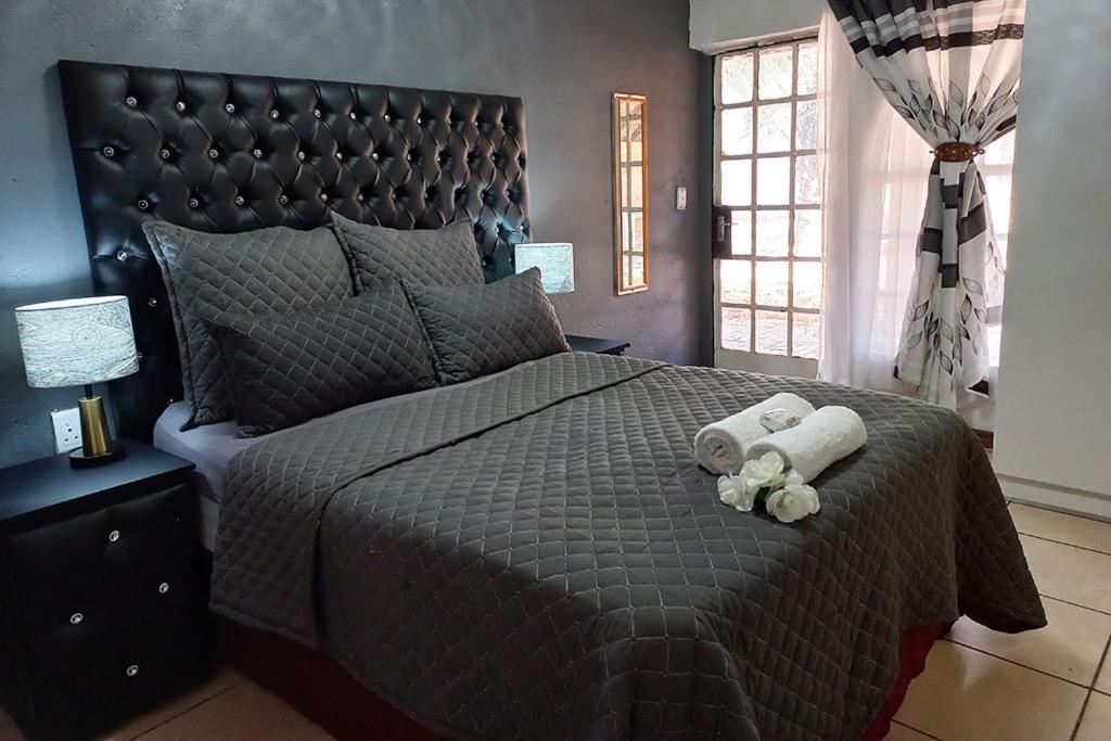 Queens Palace Pretoria Quarto foto