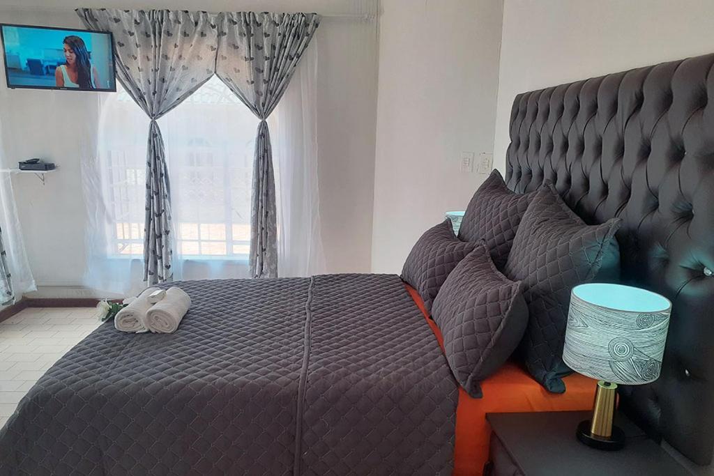 Queens Palace Pretoria Quarto foto