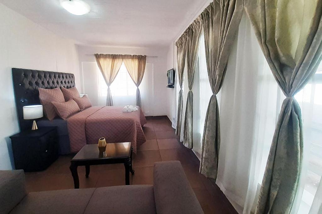 Queens Palace Pretoria Quarto foto